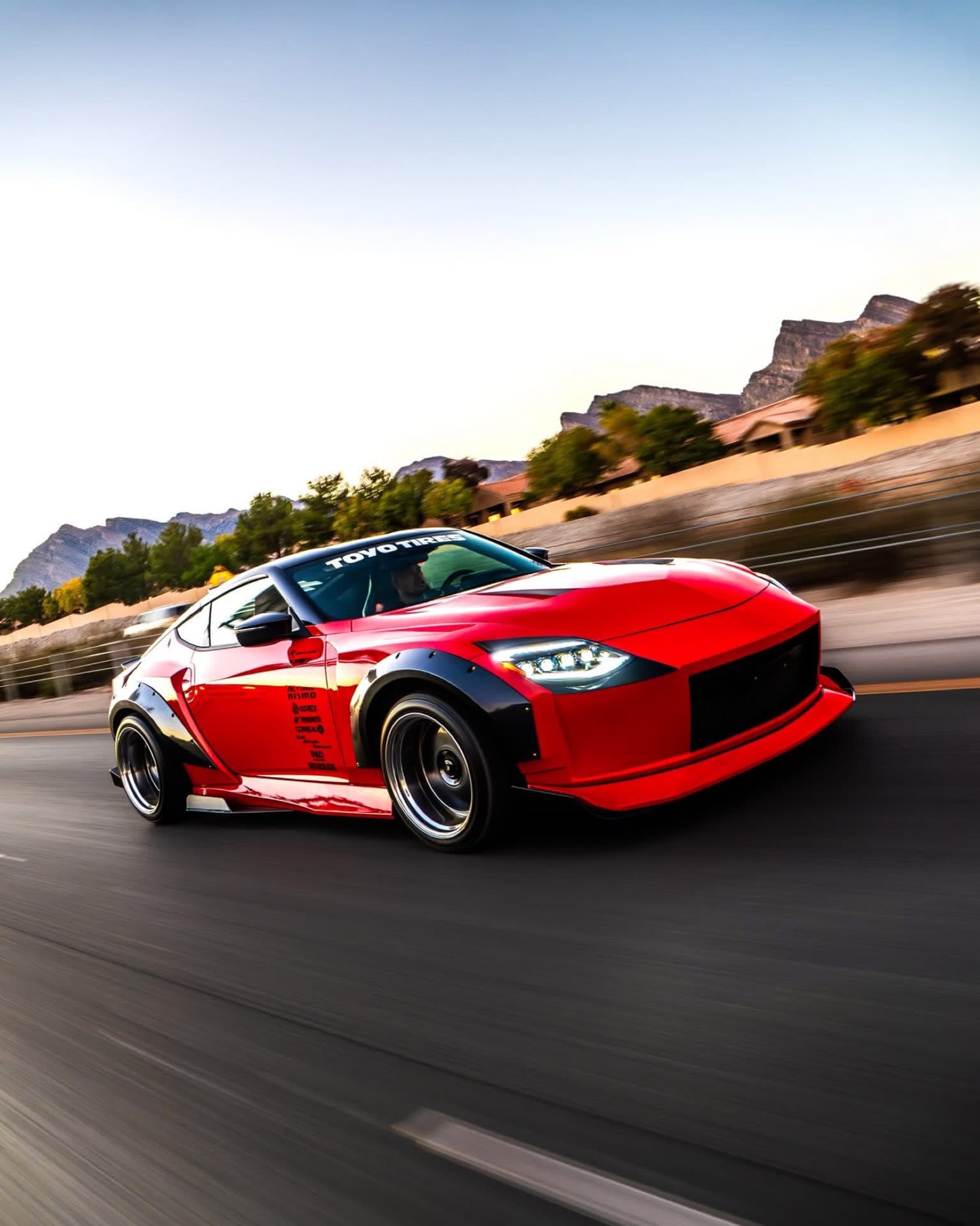 The Garage 46 widebody Z at speed on the highway